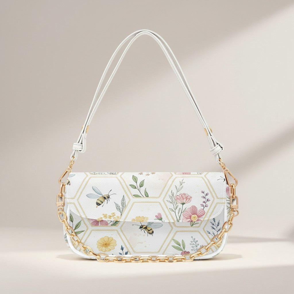 Handbag with floral and bee pattern on a beige background